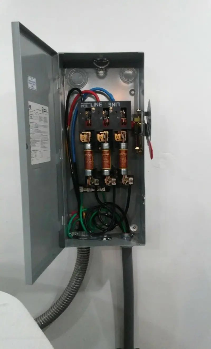 Three-phase disconnect switch installed for Smoke Detector Installation in Dania Beach